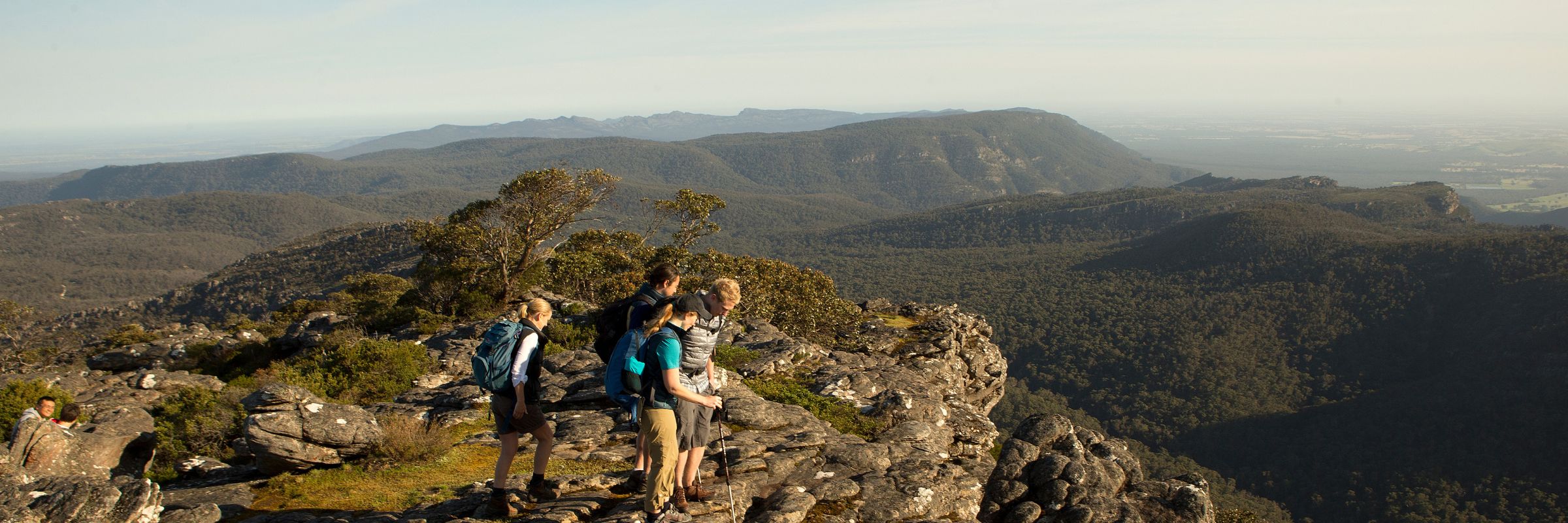 bottle of subrosa viognier lying on the granite rocks in the grampians wine region