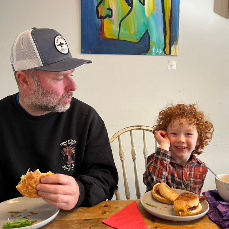 adam louder and his son at home in the grampians